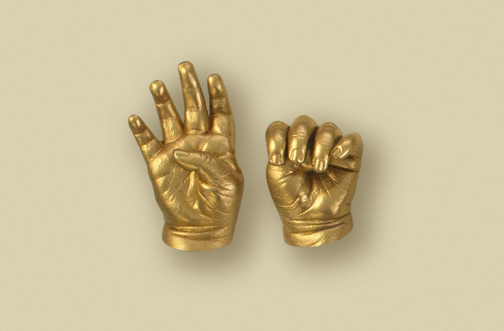 Gold baby hand casting